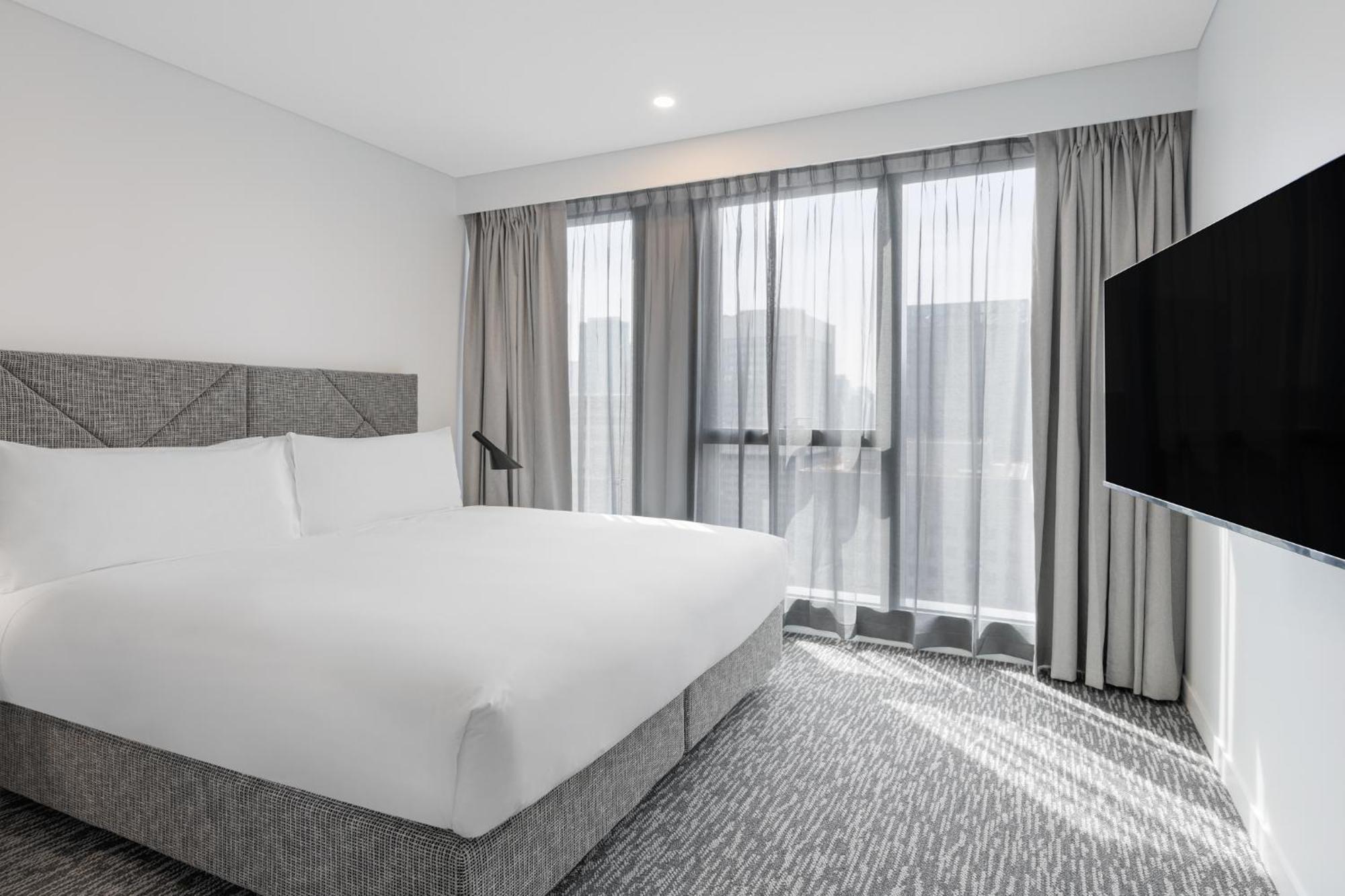 Meriton Suites Melbourne Eksteriør bilde A bedroom at the hotel